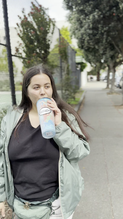 Angelina strolls with a Single® Medium Sticker on her mug.