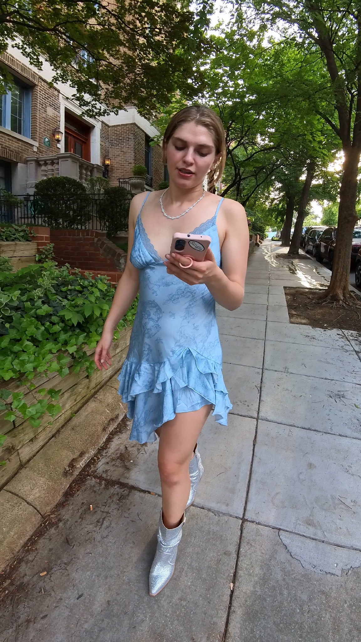 Maeve heads out for an evening in Adams Morgan with a Single® Small Sticker on her phone.