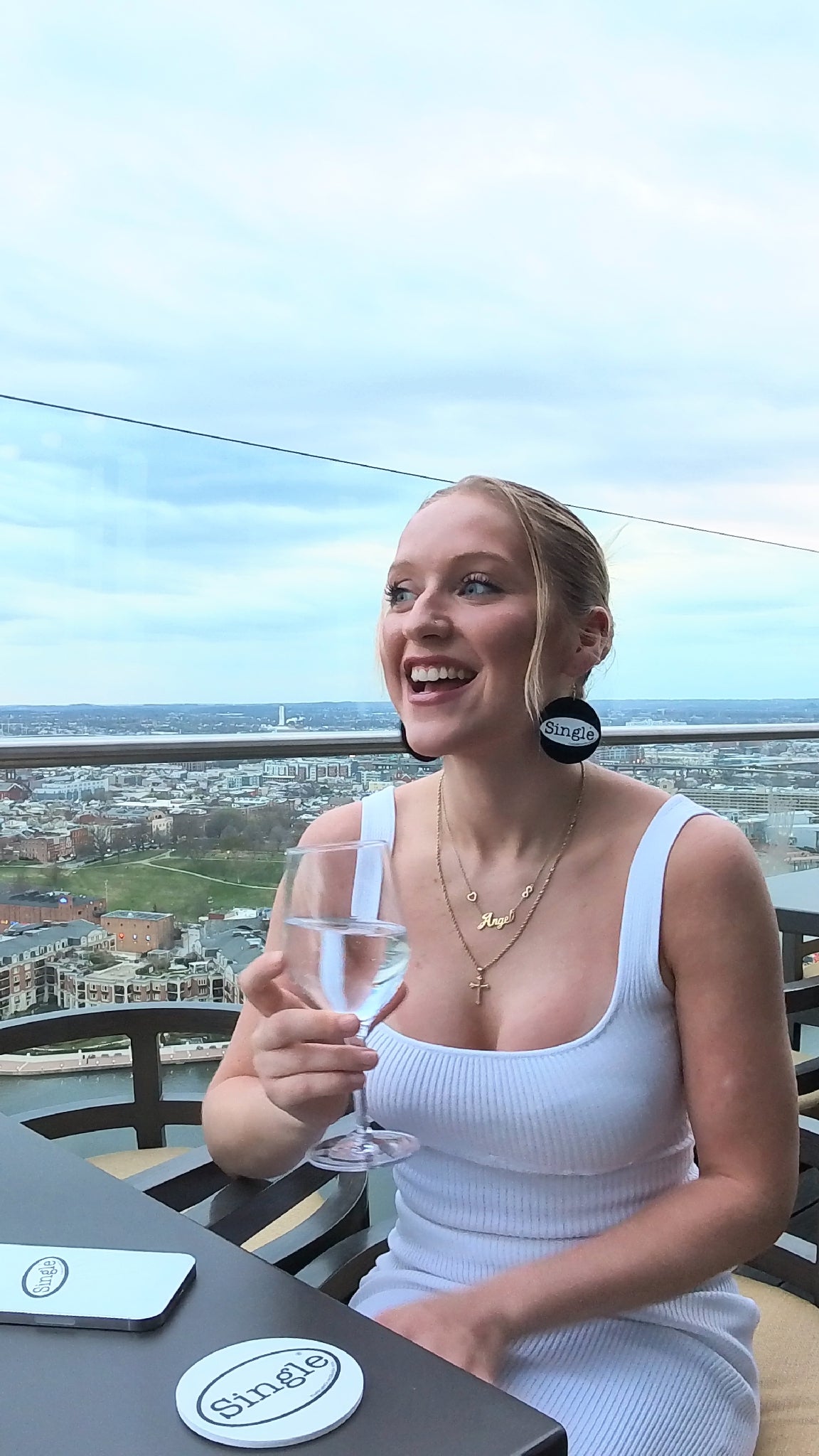 Sydney’s earrings and phone have the Single® Small Stickers applied to them.